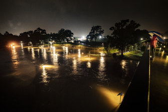 The flooded Tench Reserve boat ramp in Penrith early on Monday morning as the Nepean River begins to breach its banks after days of heavy rain.