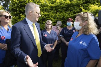 Opposition Leader Anthony Albanese meets healthcare workers at Cessnock Hospital, in NSW, last month.