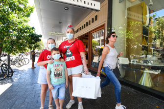 The Clark family opted to wear masks for additional protection as they travelled from the South Coast for a two-day shopping trip in Sydney.