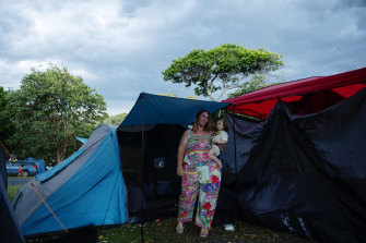 Karrina Kemp and her three children spent three weeks living in a tent while waiting to be allowed across the Queensland border.