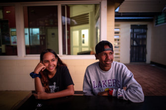 Students Tinaysha Young and Deondre Mawson relax at the boarding house after another school day. 