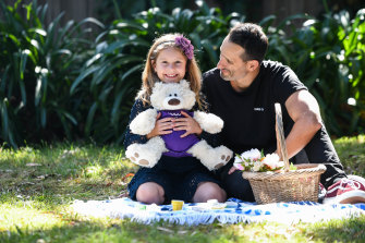 Alex Wadelton and his daughter Lila with the teddy bear Epilepsy Action Australia sent her.