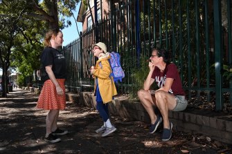 Aine Healy and Emma Wood, two of the organisers of Marrickville Public School’s inclusive education P&C sub-committee, with a friend’s daughter Edie Proud.