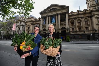 Rebecca Scott (left) of Moving Feast and lord mayor Sally Capp outside the Melbourne Town Hall. 