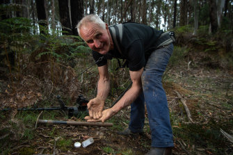 Glenn Conroy with the gold he found in the Wombat State Forest on a trip with The Age in December. 