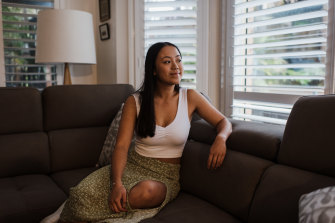 Claudia, 22, at home in Gymea. She was adopted by an Australian caucasian parents, but her birth parents are Chinese and Indonesian. 