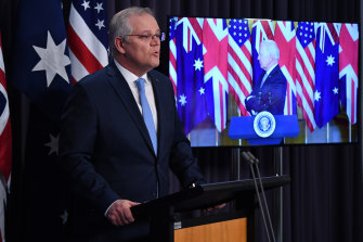 Prime Minister Scott Morrison appeared with US President Joe Biden and British Prime minister Boris Johnson at a rare joint virtual press conference this morning. 