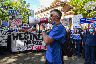 Nurses rally in Macquarie Street, Sydney  demanding better pay.