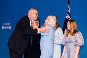Prime Minister Scott Morrison greeting his mother, wife and daughters after his speech. 