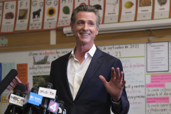 Governor Gavin Newsom pointed to growing mandates at workplaces as a model for schools.