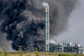 A dark cloud of smoke rises above Chempark in Leverkusen, Germany, Tuesday following an explosion.