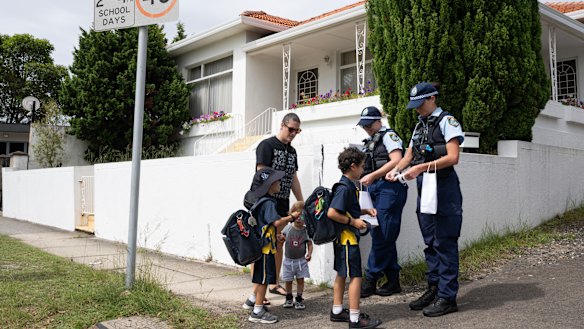 Police handed out wristbands as students are picked up from Mount Sinai College.