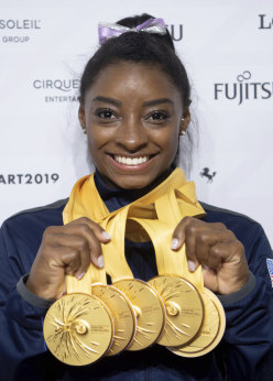 American Simone Biles with her five gold medals.