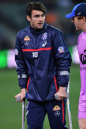 Easton Wood on crutches in Adelaide.
