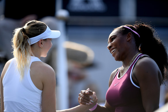 Serena Williams, right, shakes hands with Amanda Anisimova, left, after her semi-final win. 