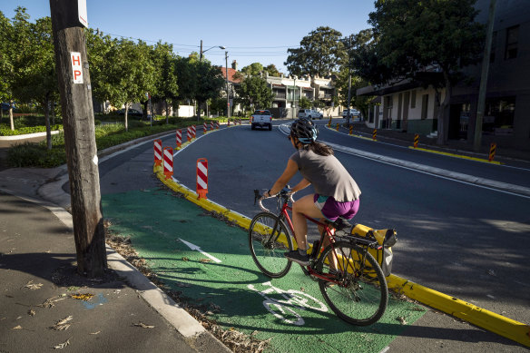 A cyclist travelling along Bridge Road.