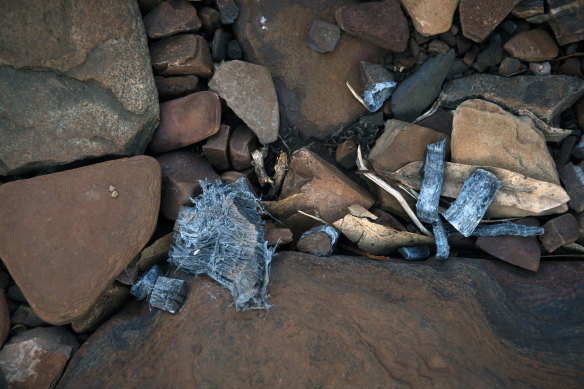 Blue chunks of asbestos near a river in Wittenoom, Australia on August 17, 2022. 