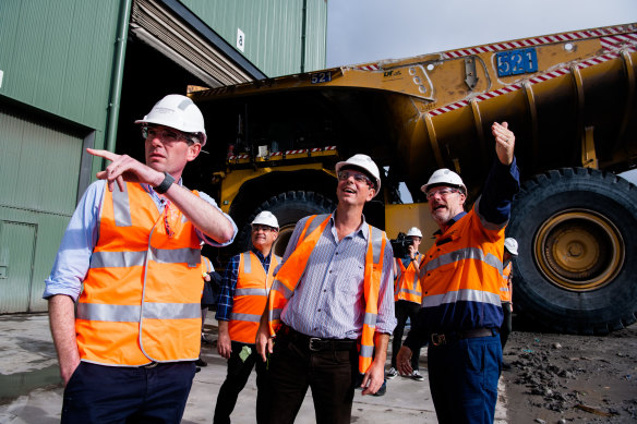 Treasurer Dominic Perrottet, Nationals’ leader John Barilaro and Upper Hunter Nationals’ candidate David Layzell at the Ravensworth open cut coal mine, north of Singleton.