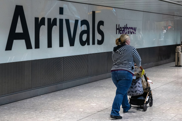 A passenger at Heathrow Airport in London. The UK government wants to slash immigration levels.