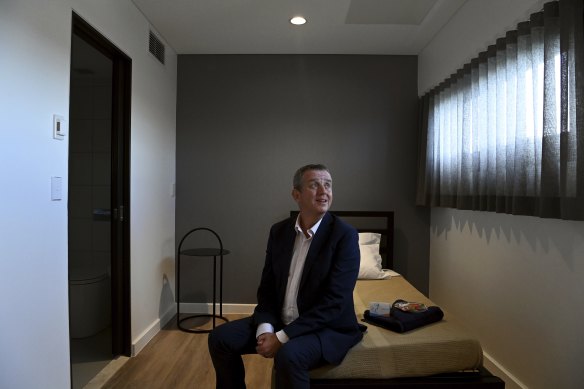 CEO and superintendent of Wesley Mission, Reverend Stuart Cameron in one of the bedrooms in the accommodation area at the newly refurbished Wesley Edward Eagar Centre in Surry Hills.