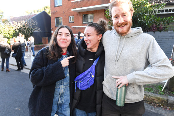 Happy buyer Millie (centre) congratulated by friends after the auction.