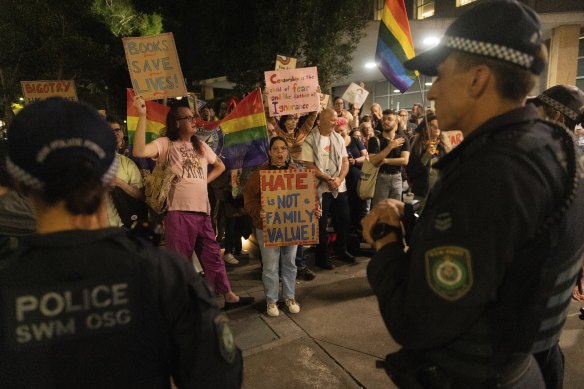 Protesters clashed outside the council chambers amid a heavy police presence.