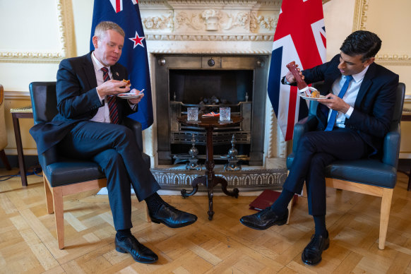 New Zealand’s Prime Minister Chris Hipkins (left) eats sausage rolls with his UK counterpart Rishi Sunak at Number 10 Downing Street.
