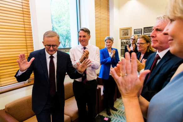 Anthony Albanese is applauded by the Labor caucus.