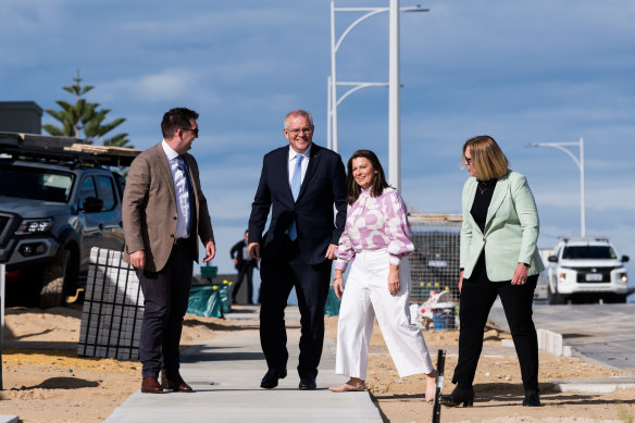 Prime Minister Scott Morrison and Jenny Morrison visits a housing estate in Jindalee in WA on Friday.