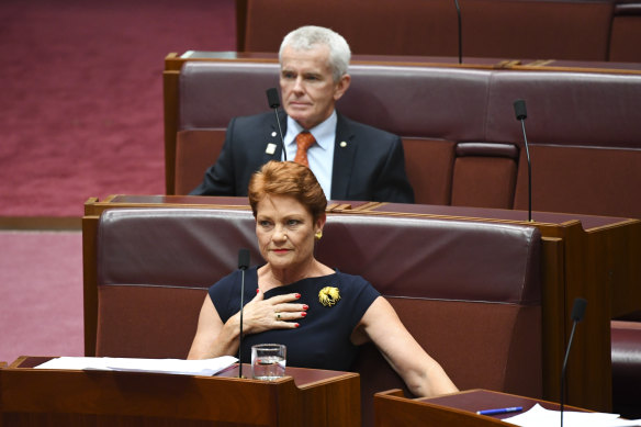 One Nation senators Pauline Hanson and  Malcolm Roberts in February. Their votes are crucial to Labor's bid to wind back a reduction in the time workers have to consider pay and conditions changes.