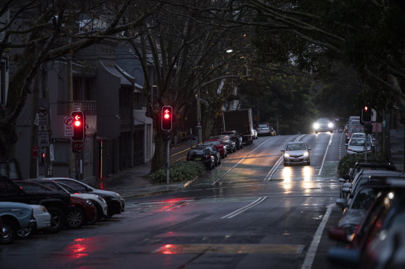 Quiet Sydney streets on a wet, chilly Friday night.