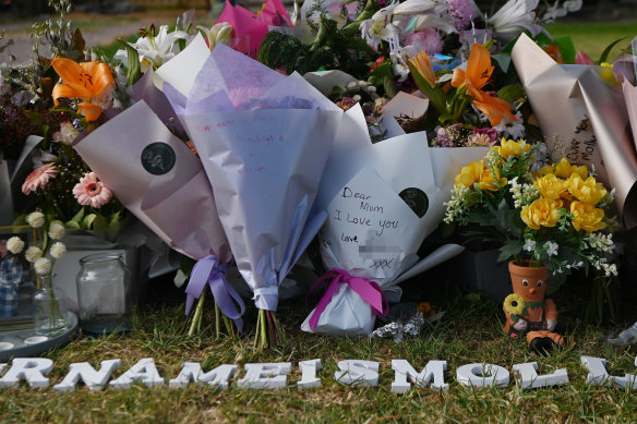 A bouquet with the message ‘Dear Mum, I love you,’ among other flowers paying tribute to Molly Ticehurst.