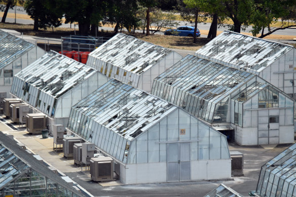 Rows of damaged greenhouses at the CSIRO's Canberra campus after an unseasonal hailstorm.