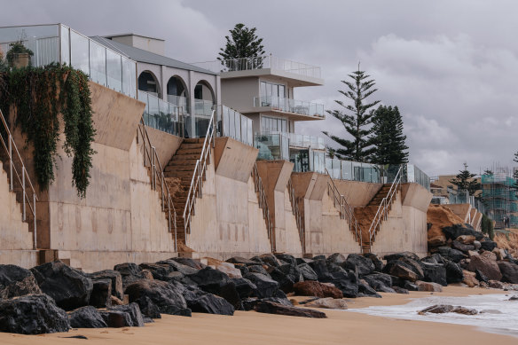 Is it time to retreat? Erosion comes right up to the seawall at Collaroy last August. 