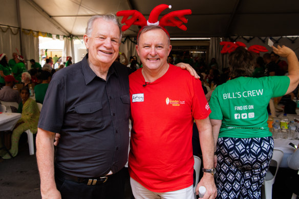 Labor leader Anthony Albanese with Reverend Bill Crews on Christmas Day in 2019.