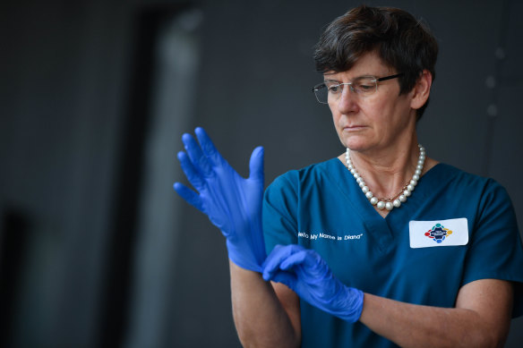 Professor Diana Egerton-Warburton with some protective gloves.