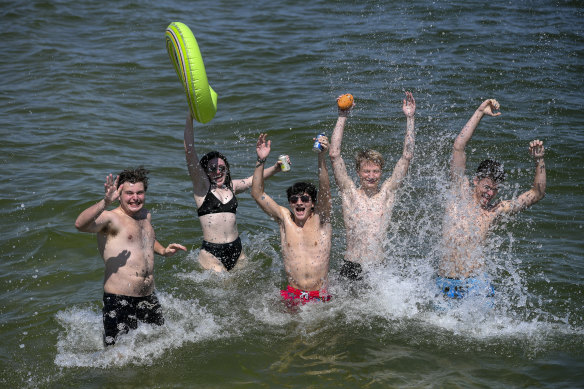 Beachgoers seek a break from the hot weather at South Melbourne on Wednesday.