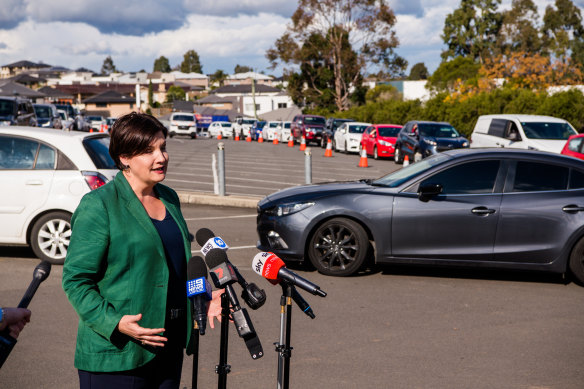 NSW Labor leader Jodi McKay addresses reporters from the car park.