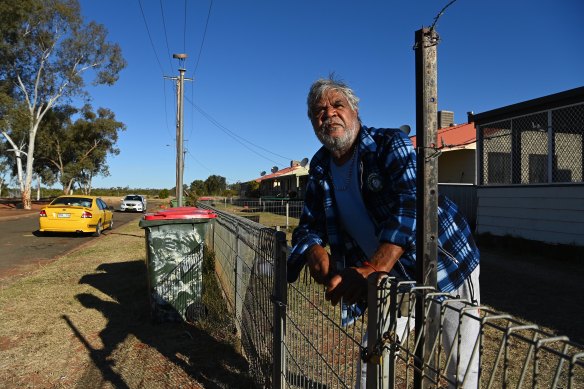 Dudley Shillingsworth, 63, at his padlocked front gate to keep COVID-19 out of his home in Clara Hart Village outside Enngonia. 
