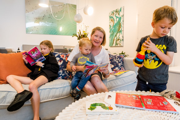 Clare Maple-Brown from Randwick with her three children Charlotte, 9;  Max, 4; and Robbie, 1. She wants rapid antigen testing to replace isolation for primary students. 