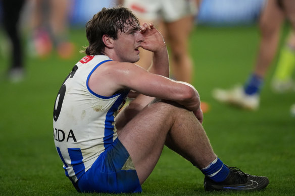Lionhearted North Melbourne youngster George Wardlaw reacts to his team’s loss to Collingwood.