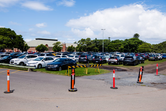 The parking of vehicles on fields at Moore Park has been controversial for years.