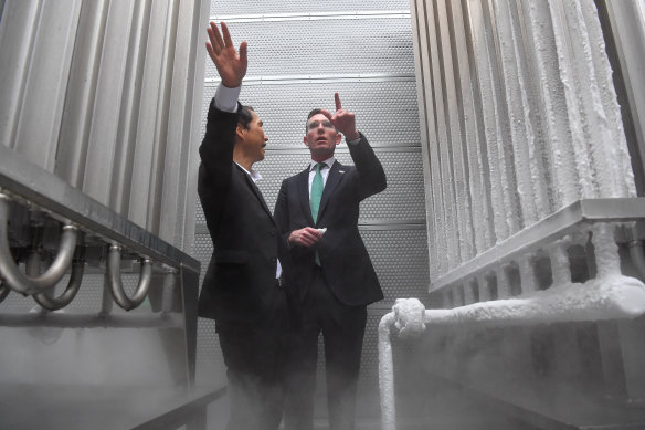 Premier Dominic Perrottet with Iwatani Corporation’s Yukio Awazu at the company’s liquified hydrogen tanks in Tokyo.