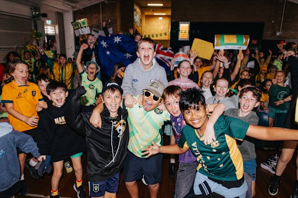 Students at Rozelle Public School during the Socceroos match on Friday.