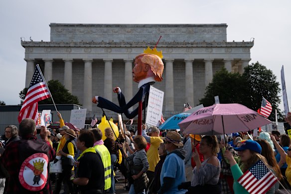 Crowds walk past the Lincoln Memorial during the protest.