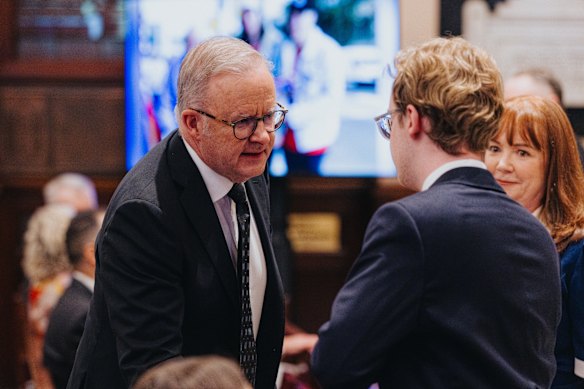 Prime Minister Anthony Albanese meets with Darcy Richardson ahead of the funeral service beginning.