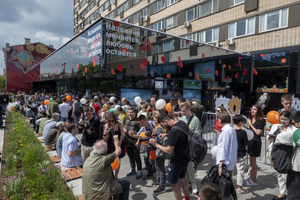 People line up to visit the newly opened fast food restaurant in a former McDonald’s outlet in Moscow.