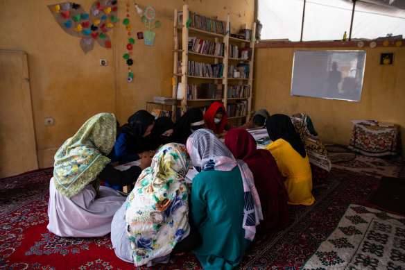 Girls attend class at a secret school in Kabul, Afghanistan. Secondary education for girls has been banned since shortly after the Taliban regained control of the country last year.