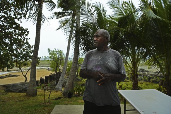 Stanley Cook in his garden on the shoreline on Thursday Island. 