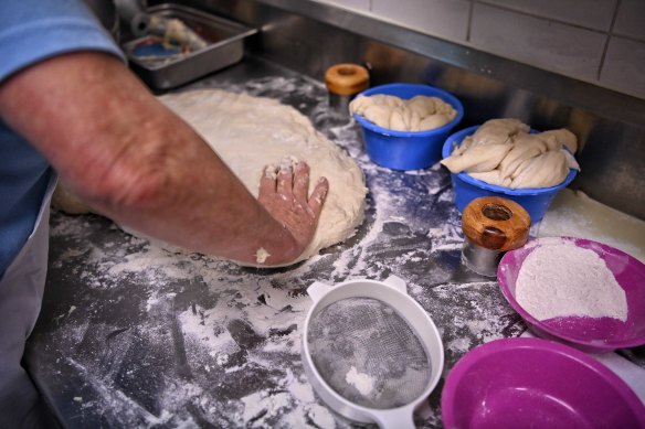 No knead: CWA Volunteers bake scones at the Sydney Royal Easter Show on Thursday.